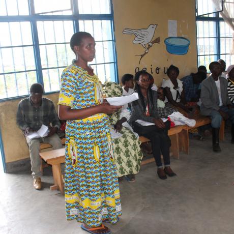 Hillaria Mujawamungu,a farmer,presenting the community evaluation 