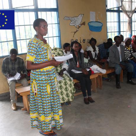 Hillaria Mujawamungu,a farmer,presenting the community evaluation 