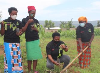 Women in Kayonza District planting trees for climate change mitigation